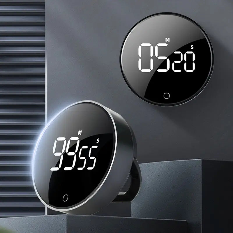 Circular Timer showing how it can support itself and stick to metal surfaces,
